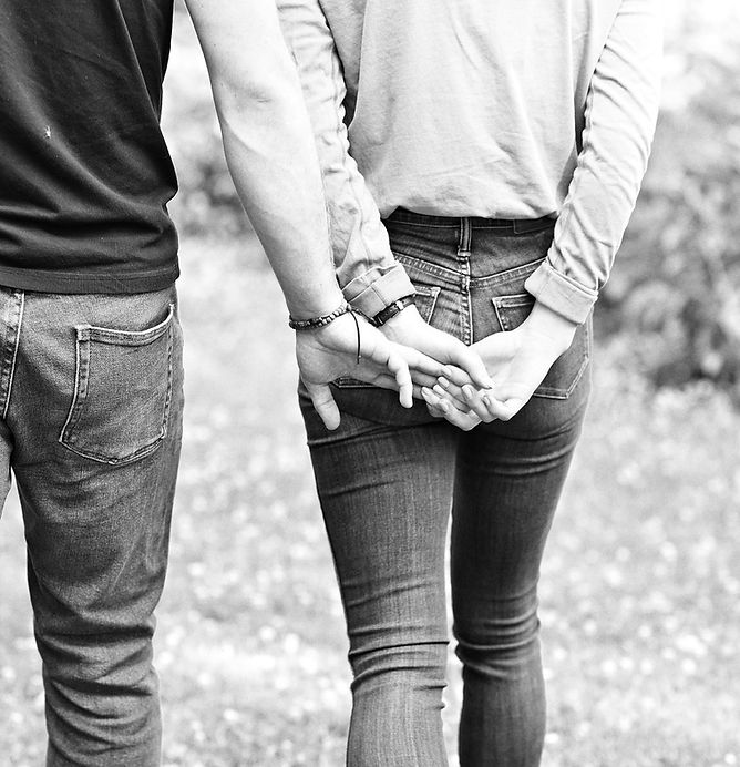 Couple holding hands